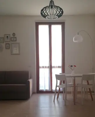 Area soggiorno di San Bartolo Rent Apartments, due passi da Firenze