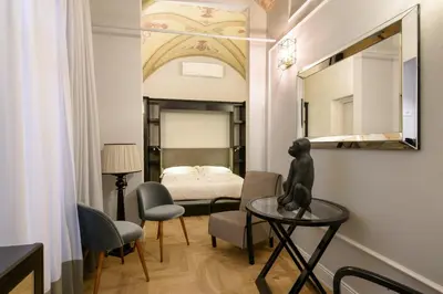 Letto o letti in una camera di Vivaldi luxury suites