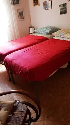 Letto o letti in una camera di CozyandCalm