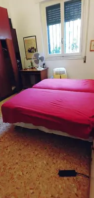 Letto o letti in una camera di CozyandCalm