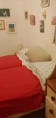 Letto o letti in una camera di CozyandCalm