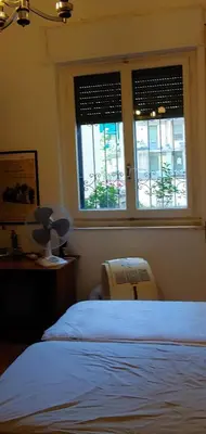 Letto o letti in una camera di CozyandCalm