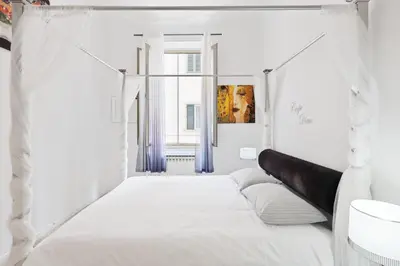 Letto o letti in una camera di GuestHost - Carpe Diem Arno Apartment