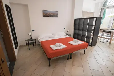 Letto o letti in una camera di Amalia Apartment Via La Farina