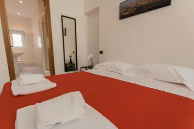 Letto o letti in una camera di Amalia Apartment Via La Farina