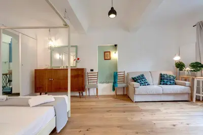 Area soggiorno di Scala Apartment by Mamo Florence