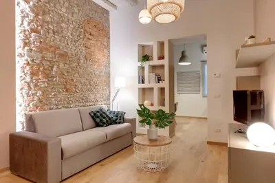 Area soggiorno di Borgo Apartment by Mamo Florence