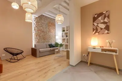 Area soggiorno di Borgo Apartment by Mamo Florence