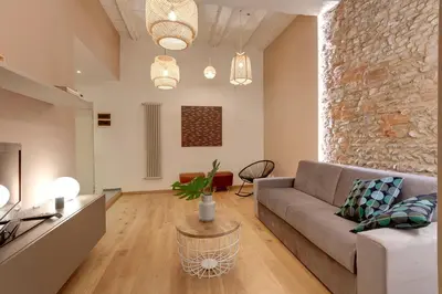 Area soggiorno di Borgo Apartment by Mamo Florence