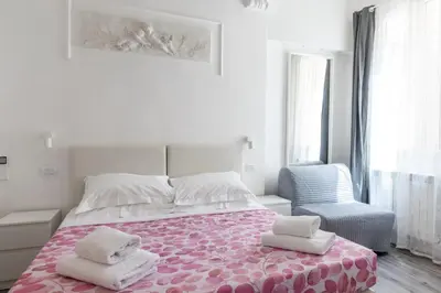 Letto o letti in una camera di Michelangelo's Place