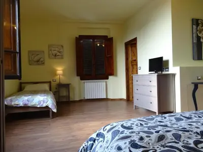 Letto o letti in una camera di Bed & Breakfast La Tavernetta