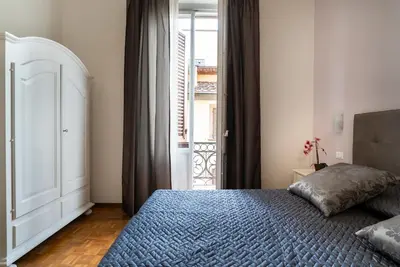 Letto o letti in una camera di Live Florence Guest House