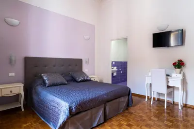 Letto o letti in una camera di Live Florence Guest House