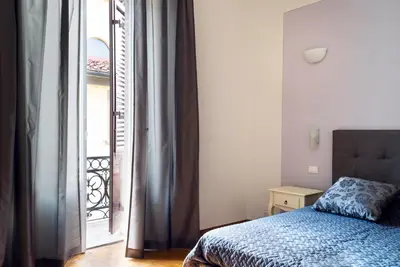 Letto o letti in una camera di Live Florence Guest House