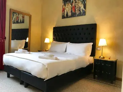 Letto o letti in una camera di Guest House Le Contesse