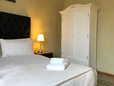 Letto o letti in una camera di Guest House Le Contesse
