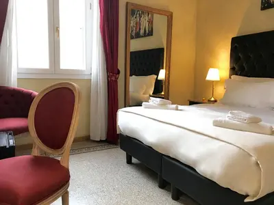 Letto o letti in una camera di Guest House Le Contesse