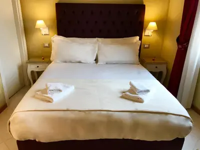 Letto o letti in una camera di Guest House Le Contesse