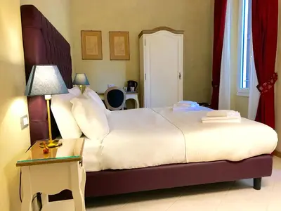 Letto o letti in una camera di Guest House Le Contesse
