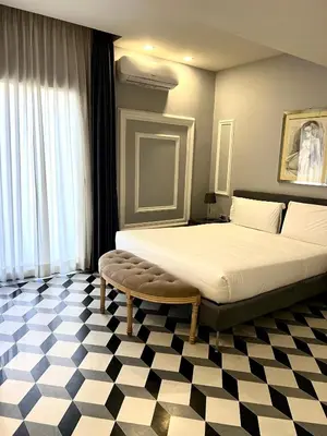 Letto o letti in una camera di Le stanze di caterina