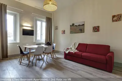 Area soggiorno di Opera - Sinfonia - Minuetto - Melody Apartments by Mamo Florence