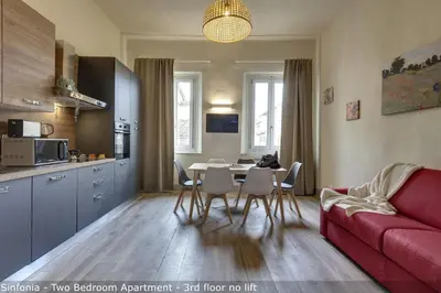 Cucina o angolo cottura di Opera - Sinfonia - Minuetto - Melody Apartments by Mamo Florence