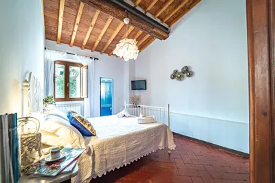 Letto o letti in una camera di Oltrarno Apartment