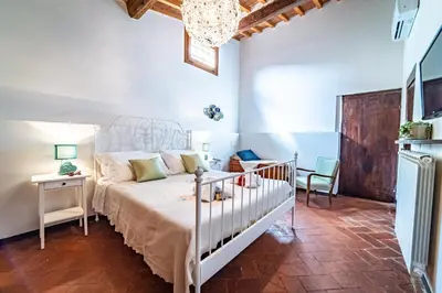 Letto o letti in una camera di Oltrarno Apartment