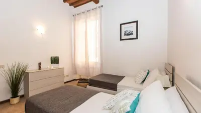 Letto o letti in una camera di Rental in Rome - Santa Maria Novella Palace