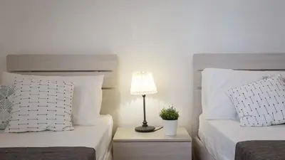 Letto o letti in una camera di Rental in Rome - Santa Maria Novella Palace
