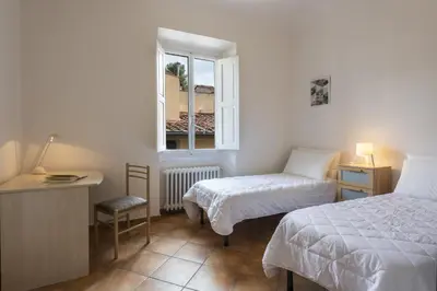 Letto o letti in una camera di Apartments Florence - Eolo