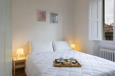 Letto o letti in una camera di Apartments Florence - Eolo