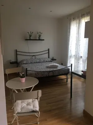 Letto o letti in una camera di Lulù