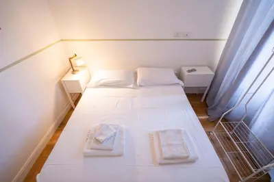 Letto o letti in una camera di La Marmora 3 bedroom apartment near Galleria dell'Accademia