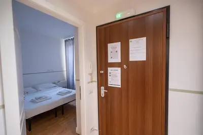 Letto o letti in una camera di La Marmora 3 bedroom apartment near Galleria dell'Accademia