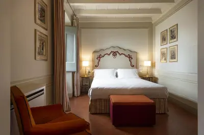 Letto o letti in una camera di Torre a Cona Wine Estate