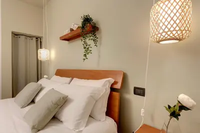 Letto o letti in una camera di Ghibellina Apartment by Mamo Florence