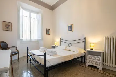 Letto o letti in una camera di Santa Maria Novella 4 bedrooms by Mmega
