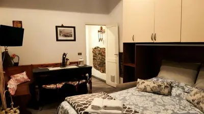 Letto o letti in una camera di La Vecchia Firenze