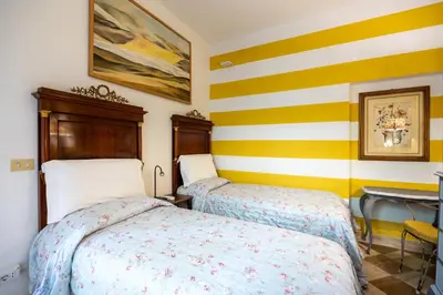 Letto o letti in una camera di Casa del Gelsomino e del Nespolo