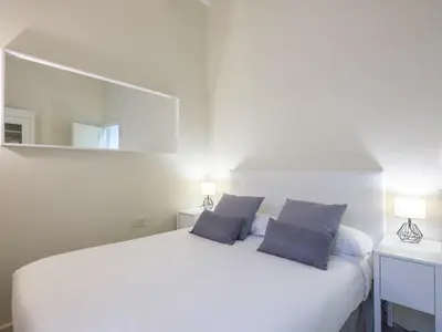 Letto o letti in una camera di BEAUTIFUL FLAT IN OLTRARNO