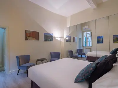 Letto o letti in una camera di BEAUTIFUL FLAT IN OLTRARNO