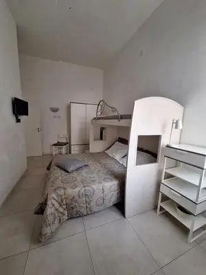 Letto o letti in una camera di Home il Piccolo Nido