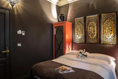Letto o letti in una camera di Porcellino Gallery Art Boutique BB