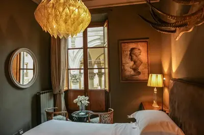 Letto o letti in una camera di Porcellino Gallery Art Boutique BB