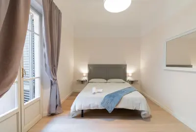 Letto o letti in una camera di PURE LUXURY IN OLTRARNO FLORENCE