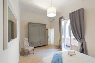Letto o letti in una camera di PURE LUXURY IN OLTRARNO FLORENCE