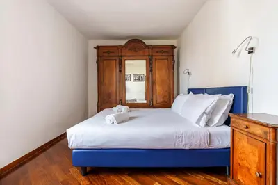 Letto o letti in una camera di Portinari Apartment