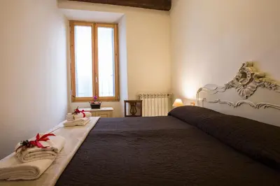 Letto o letti in una camera di Charming Fiesolana Apartment in heart of Florence
