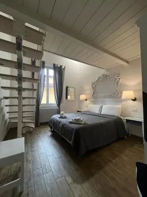 Letto o letti in una camera di In San Frediano